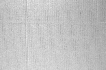 Old white paper texture with streaks close-up