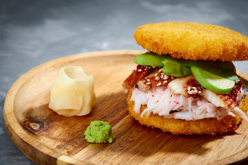 sushi menu with burger made from rice and smoked eel, avocado, light cheese and nori