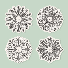 Vector set of doodle snowflakes. Kawaii winter characters. Christmas stickers. Outline illustration.