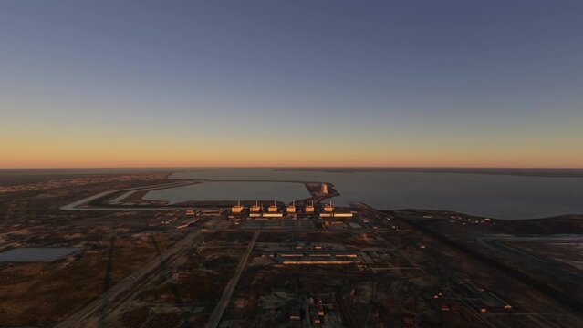 Aerial frontal shot at sunset of the Zaporizhzhia Nuclear Power Station in Ukraine. Europe