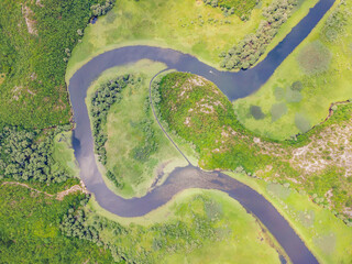 Canyon of Rijeka Crnojevica river near the Skadar lake coast. One of the most famous views of Montenegro. River makes a turn between the mountains and flows backward