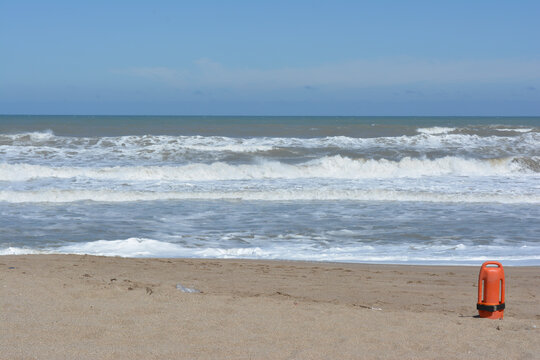 beach, sea coast with holas and lifeguard lifeguards.
