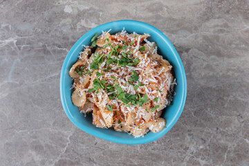 Greens vegetable with farfalle pasta in the bowl , on the marble background