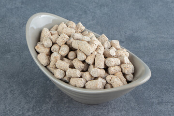 A bowl full of rye crispy cereals