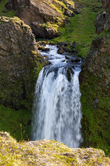Fototapeta na wymiar an unknown little waterfall next to the famous Seljalandsfoss waterfall, Iceland