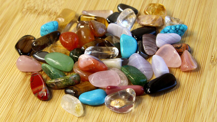 Collection Of Semi-Precious Gemstones on white textured background