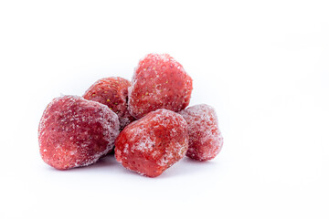 heap of frozen strawberry on white background with copy space 