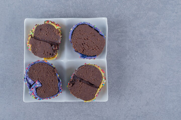 Fresh homemade cake slices on white plate