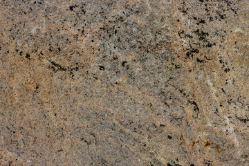 Stone texture as a background for the design.