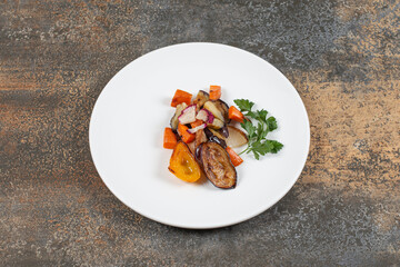 Delicious grilled vegetables on white plate