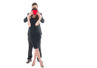 Blind love victim. Completely in love. Blind love and manipulations. Man formal suit and attractive woman. Love and romance. Romantic holiday. Man hold valentines heart. Happy guy with red heart