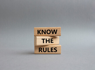 Know the rules symbol. Wooden blocks with words Know the rules. Beautiful grey background. Business and Know the rules concept. Copy space.