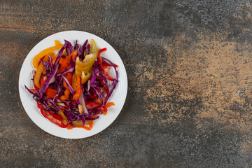 Various sliced vegetables on white plate