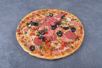 Freshly baked margarita pizza on grey background