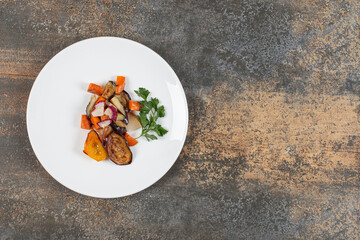 Delicious grilled vegetables on white plate