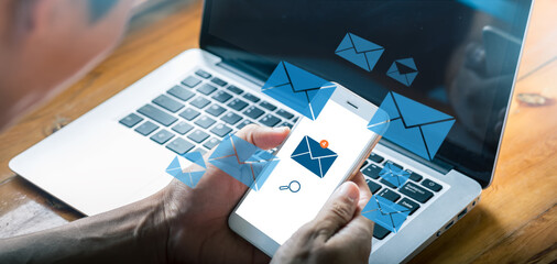 E-mail marketing concept, businessman reading e-mail on smartphone, receive new message