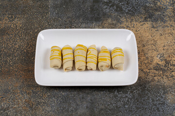 Delicious handmade biscuits on white plate