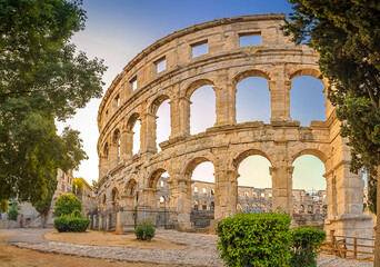 Panorama medieval Ancient Roman Amphitheater in Pula at dawn, Croatia. Architecture and landmark of Croatia. Travel concept background.