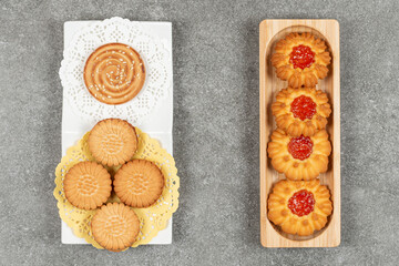 Assortment of delicious biscuits on various plates