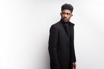 Handsome multiracial young man looking away while posing