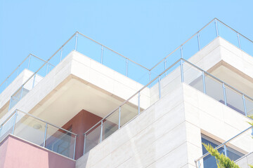 Exterior of beautiful building with balconies, low angle view