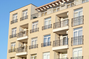 Obraz premium Exterior of beautiful residential building with balconies