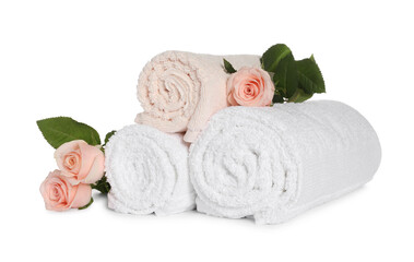 Fototapeta na wymiar Clean soft towels with flowers isolated on white