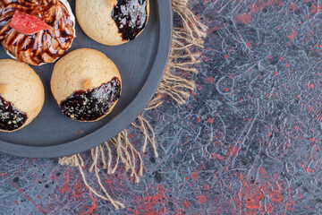 Sweet Fresh cookies on wooden board