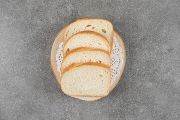 White bread slices on marble background