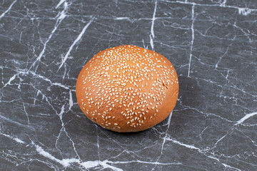 Sesame seed burger buns , on the marble background