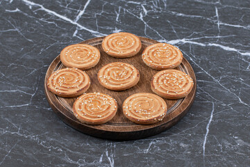 A tray of roll cookie, on the marble background