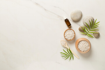 Composition with spa products on marble background, top view