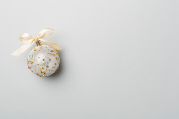 Obraz premium Christmas toy on color background, top view