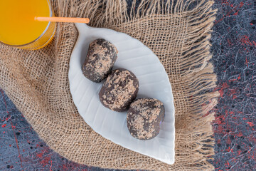 Fresh chocolate cookies with orange juice