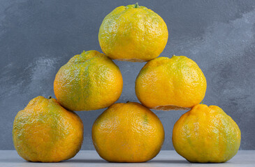 Fresh organic tangerine row . Fruit concept