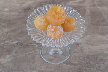 Dried fruit on a fruit plate , on the marble background