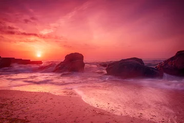 Fototapeten Sonnenaufgang am Meer © Roxana