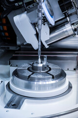 CNC machine. Metalworking heavy industry. High-tech and high-speed metal processing.