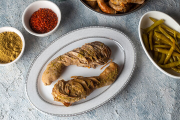 Traditional Turkish Stuffed rice tripe or offal food on the table in Turkish Restaurant. Shirdan Dolma is the favorite food Adana city of Turkey. (Turkish name; Sirdan)