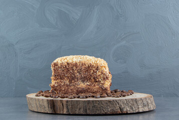 A piece of delicious pie with coffee beans