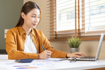 Accountant, attractive asian young woman sitting work from home, calculate tax income, expenses...