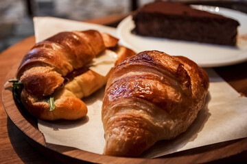 two delicious savory croissants with ham and rocket. The savory alternative to the classic sweet croissant