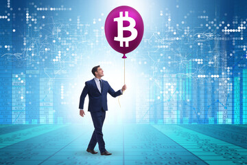 Businessman in bitcoin bubble concept