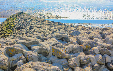Seascape beach mudflats hiking on the North Sea coast Germany.