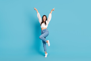 Fototapeta na wymiar Full length portrait of overjoyed gorgeous person point fingers dance enjoy discotheque isolated on blue color background