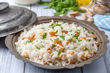 Traditional delicious Turkish food; Almond rice pilaf (Turkish name; Bademli pirinc pilavi)
