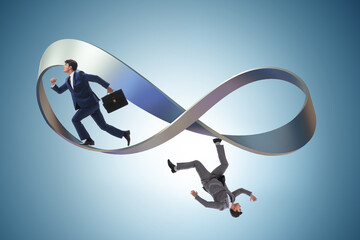 Businessman running on the endless loop