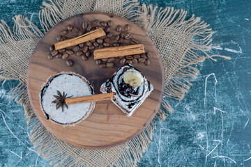 delectable cocktail on the board, on the blue background