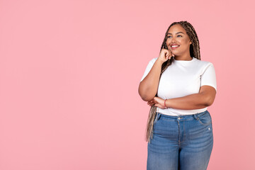 African Plus Size Lady Looking Aside Standing Over Pink Background