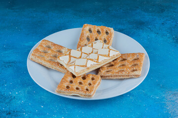  display of cookies on the plate on the blue background